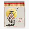 Load image into Gallery viewer, Vintage matchbox where a mysterious cowboy rocks up before the golden evening sun with a lasso in one hand and a ciggie in the other..
